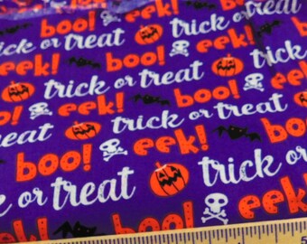 Purple Stripe Fabric with the Words Boo! Eek! and Trick or Treat!. Orange Pumpkins, Black Bats and White Skulls on Jo-Ann Fabric- BTY
