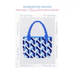 May include: A cross-stitch pattern featuring a tote bag design with a geometric blue, light blue, and white repeating pattern. The text Herrington Design Printable Hand Stitched Designs is printed at the top, with Herrington Design repeated along the borders.