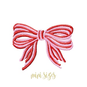May include: Embroidered bow in red and pink, with a layered design. The bow is centered on a white background, with the words "mini sizes" in gold script below it. This decorative bow is suitable for various craft projects.