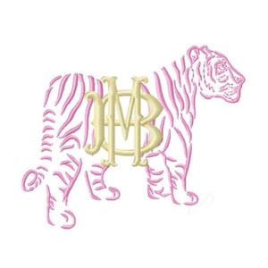 May include: Embroidered tiger design in pink and white, featuring a monogram. The tiger has pink stripes and a gold monogram. The design is set against a white backdrop. Ideal for embroidery projects.