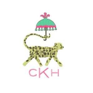 May include: An embroidered design featuring a yellow leopard with black spots, walking beneath a teal umbrella with pink trim and tassels. The initials "CKH" are embroidered in pink below the leopard.