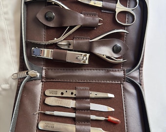 12-Piece Professional Manicure Pedicure Set - Stainless Steel Nail Grooming Kit with Leather Case.