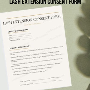 May include: A cream-colored Lash Extension Consent Form with black text. The form includes sections for client information and a consent agreement. The text "LASH EXTENSION CONSENT FORM" is at the top. The form is on a light beige surface.