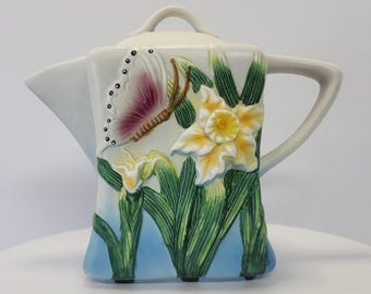 Bisque Porcelain Teapot Square Shaped with Raised Daffodil Butterfly Design Glazed Inside