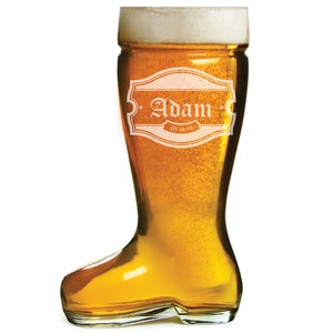 May include: A personalized boot-shaped beer glass with the name "Adam" and the date "08.13.14" etched on the front.