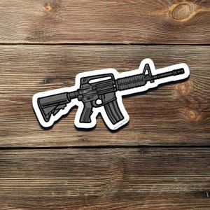Cartoon AR-15 Rifle Sticker – Patriotic Pro 2A Gun Rights Vinyl Decal for Car, Laptop, Cooler, or Water Bottle
