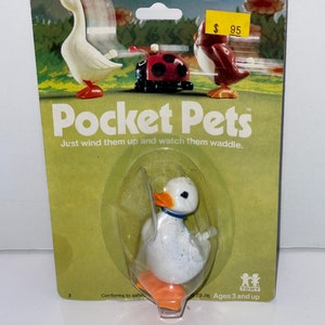 vintage 1978 Tomy pocket pets duck white knob wind up toy new in package made in Taiwan
