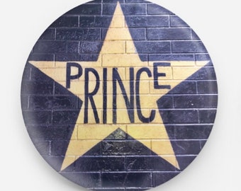 1 inch button of original photograph from my series of local businesses photos first Ave wall with the painted gold star for Prince