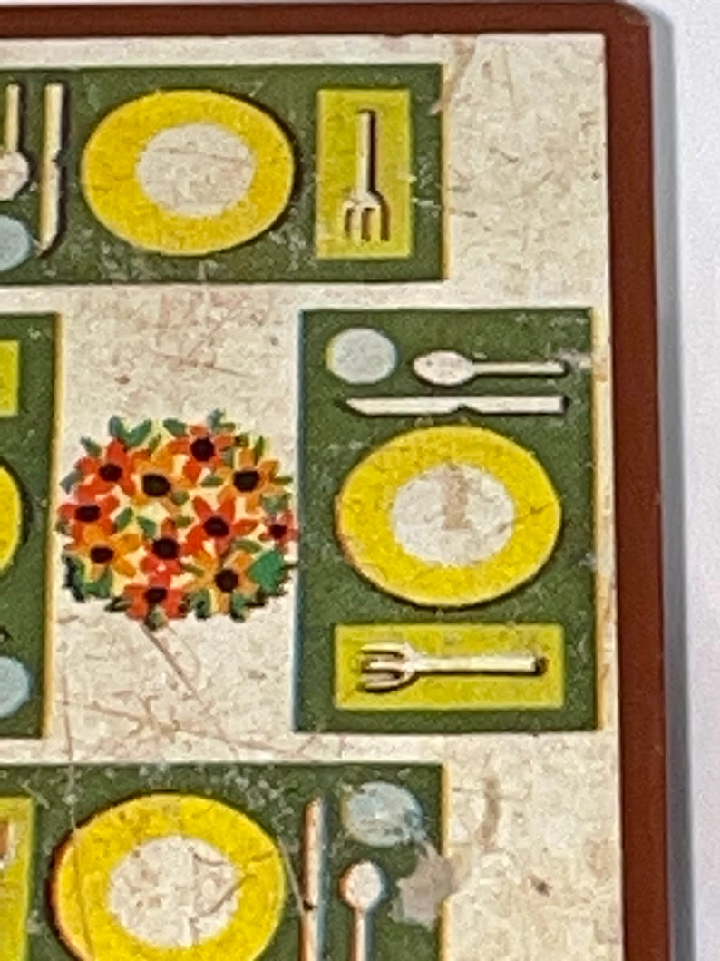 May include: A vintage illustration of a table setting with plates, silverware, and a floral centerpiece. The illustration is in a retro style with a green and yellow color scheme.