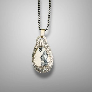 Black and White Chaney and Silver pendent