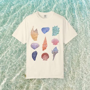 Seashell Shirt ~ Beach vibes, Casual Summer Wear, swim suit cover up, coastal graphic tee, original art on tee,  seashell art, laliecore