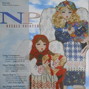 May include: A magazine cover featuring two embroidered angels with colorful floral details. The magazine is titled "Needle Pointers" and the cover story is about angels. The magazine is from March 2006.