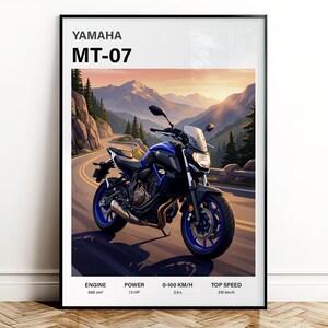 May include: A framed print featuring a Yamaha MT-07 motorcycle on a winding mountain road. The motorcycle is black and blue with blue wheels. The print includes specifications: 689 cm³ engine, 73 HP, 0-100 km/h in 3.9 seconds, and a top speed of 210 km/h.