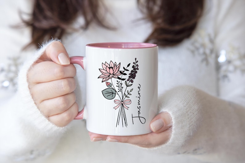 May include: A set of three ceramic mugs with a speckled, matte finish. The mugs are in shades of cream, light gray, and dark gray. Each mug has a simple, minimalist design and a rounded handle.
