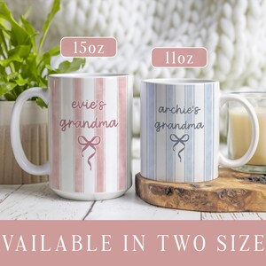 May include: Two ceramic mugs with vertical striped patterns. One mug is pink and the other is blue. Each mug has a white handle and the words "evie's grandma" and "archie's grandma" printed on them, respectively. The mugs are available in 15oz and 11oz sizes.