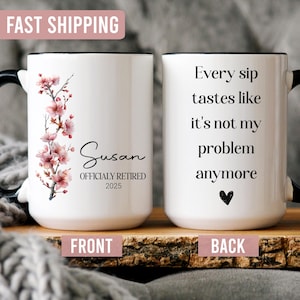 May include: White ceramic mug with a black handle and rim. The front features a floral design and the name "Susan" with "OFFICIALLY RETIRED 2025". The back says "Every sip tastes like it's not my problem anymore".