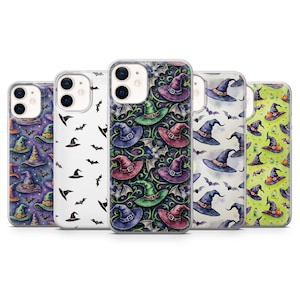 May include: A collection of phone cases with Halloween-themed designs. The cases feature patterns of witch hats, bats, and other spooky elements in various colors, including purple, green, and black. The cases are designed to fit a smartphone.