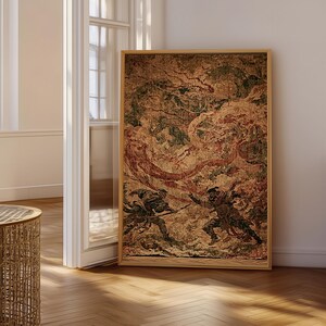 May include: A rectangular framed wall art piece featuring a detailed illustration of two figures in dynamic poses amidst swirling clouds and textured patterns in shades of deep brown, muted red, and dark green, enclosed in a light wood frame.