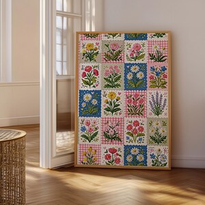 May include: A rectangular framed wall art piece featuring a grid of twenty individual square panels. Each panel displays a unique floral illustration set against backgrounds of pink gingham, solid blue, or light green, showcasing various colorful flowers.