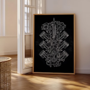 Puede incluir: Un grabado enmarcado que presenta un dibujo lineal blanco detallado de los componentes internos de un motor sobre un fondo negro. La obra de arte muestra pistones, válvulas y otras piezas mecánicas, creando una exhibición técnica y artística. El marco es de color madera clara.