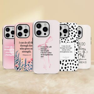 May include: A collection of phone cases with inspirational quotes. The cases feature various designs, including floral patterns, abstract black and white spots, and watercolor illustrations of ribbons. Each case displays a different quote from Philippians 4:13.
