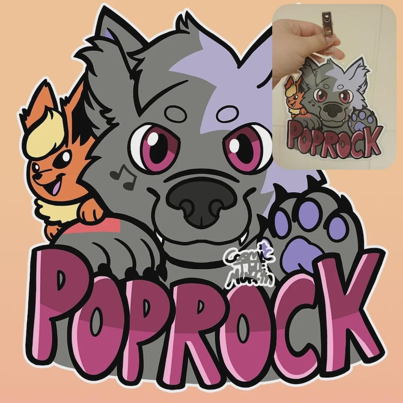 May include: A cartoon graphic featuring a gray wolf with purple accents and large pink eyes, accompanied by an orange fox-like creature. The word "POPROCK" is displayed in pink letters with a dark outline. A smaller version of the graphic is shown in the upper right corner.