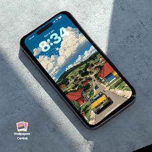 May include: A smartphone displays a scenic wallpaper of a village with red-roofed houses, a yellow car, and a blue sky with clouds. The time is 8:34 AM, and the date is Sunday, January 4th. The phone is on a gray surface.