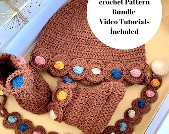 Conjunto de regalo personalizado para bebé: gorro, patucos y clip para chupete con nombre personalizado en caja de regalo.