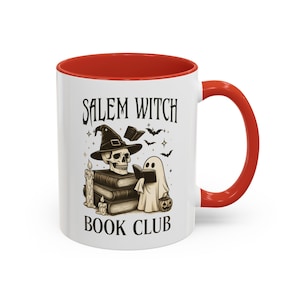 Cozy fall mug with ghost illustration for spooky mornings, red accent handle and interior, whithe exterior