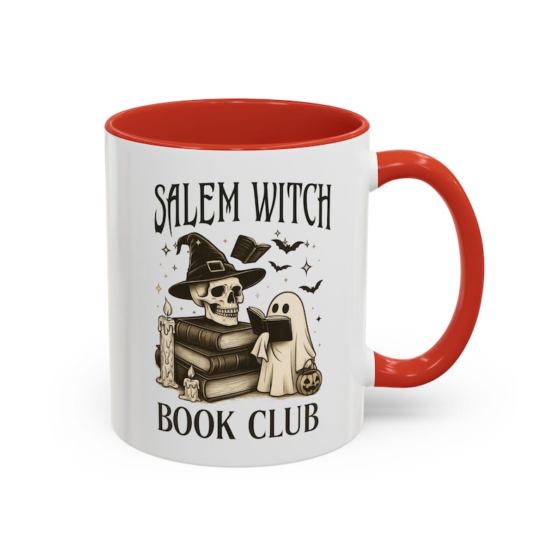 Cozy fall mug with ghost illustration for spooky mornings, red accent handle and interior, whithe exterior