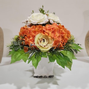 Small Faux Flower Arrangement – Orange Hydrangea, Yellow Ranunculus & White Roses in Distressed Square Vase