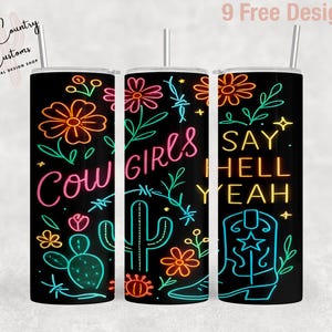 May include: Black tumbler with neon-style illustrations and text. Designs include flowers, a cactus, and a cowboy boot. Text reads "Cow Girls" and "Say Hell Yeah". Includes a straw.