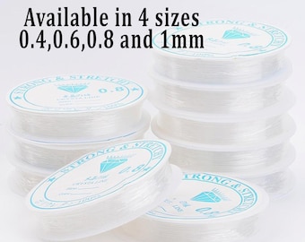 May include: Four spools of clear elastic string, each labeled "Strong & Stretch Crystal Line" with a diamond graphic and the size of the string in millimeters: 0.4, 0.6, 0.8, and 1. Available in 4 sizes: 0.4, 0.6, 0.8 and 1 mm.