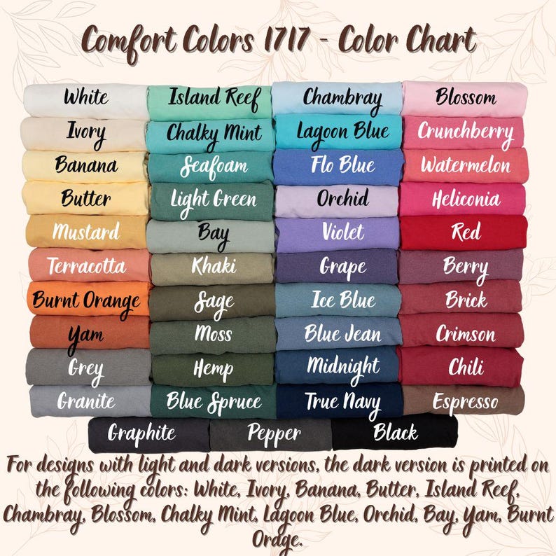 May include: Color chart of Comfort Colors 1717 t-shirts, displaying a variety of colors such as white, blue, pink, and green. The chart includes color names like "Chambray," "Blossom," and "Espresso." Text at the bottom indicates dark versions are printed on specific colors.