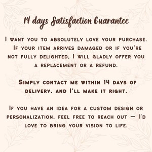 May include: A beige background with text in a handwritten style. The text reads "14 days Satisfaction Guarantee" and details a customer satisfaction policy, including replacements or refunds for damaged items or dissatisfaction.