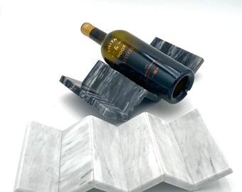 Portabotellas de mármol en zigzag: soporte escultural para vinos