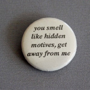 1” button or magnet with You smell like hidden motives, get away from me. Sarcastic words on pin back or magnet. Great stocking stuffer!