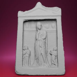 May include: A light gray, rectangular relief sculpture featuring a central figure draped in flowing robes, with two smaller figures at the sides. The sculpture has a detailed, textured surface and is set within a framed structure.
