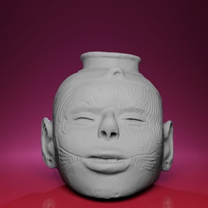 May include: A white ceramic vase shaped like a human head with closed eyes and a smiling mouth. The surface has detailed textures resembling skin and muscle. The vase has a cylindrical opening at the top and two ear-like protrusions on the sides.