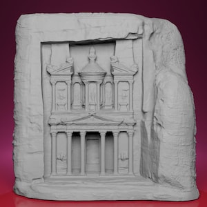 May include: A gray, 3D-printed model of the Treasury at Petra, carved into a rock formation. The architectural details include columns, a facade, and intricate carvings. The model is a detailed representation of the ancient structure.