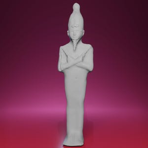 May include: A gray statue of a figure with crossed arms, wearing a tall headdress and a long robe. The statue has a serene expression and is set against a gradient background of pink and maroon.
