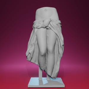 May include: A headless, gray sculpture of a draped figure, revealing the torso and legs. The figure is draped in fabric, with the legs visible from the knees down. The sculpture is mounted on a rectangular base with a support.