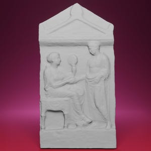 May include: A white, rectangular relief sculpture depicting two figures. One figure is seated and holding a round object, while the other stands nearby. The sculpture has a triangular top and is set against a gradient background.