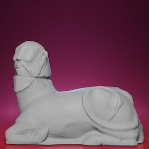 May include: A light gray sculpture of a sphinx with a human head and a lion's body. The sculpture has a detailed face with a beard and a stylized mane. The sphinx is lying down, with its tail curled around its body.