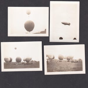 May include: A collection of vintage black and white photographs featuring hot air balloons and a blimp in the sky. The images show the balloons over a field and in flight, capturing a historical moment.