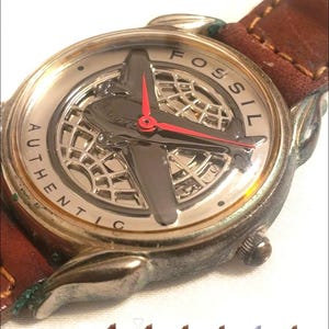 VINTAGE WOMAN’S AUTHENTIC FOSSIL AIRPLANE WATCH Fossil Airplane Watch Vintage LE Collectors Red hands Brown  main image 4