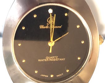 Charles Raymond UFO Styling Quartz Watch: Polished Stainless Steel, Dark Dial