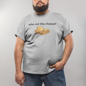 Who Cut the Cheese Joke Tee, Unisex Short Sleeve Shirt, Humorous Gift, Foodie Apparel, Casual Wear, Perfect for Parties