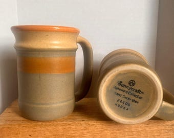 RARE Vintage Sunnycraft Stoneware Hand Decorated 12oz Mugs Set Of 2 Beige & Orange Korea Southwestern? MCM