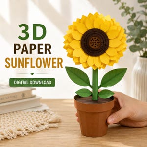 May include: A 3D paper sunflower in a brown pot with green leaves and a dark brown center. The text 3D PAPER SUNFLOWER DIGITAL DOWNLOAD is visible on the left. The sunflower has bright yellow petals arranged in layers on a green stem.